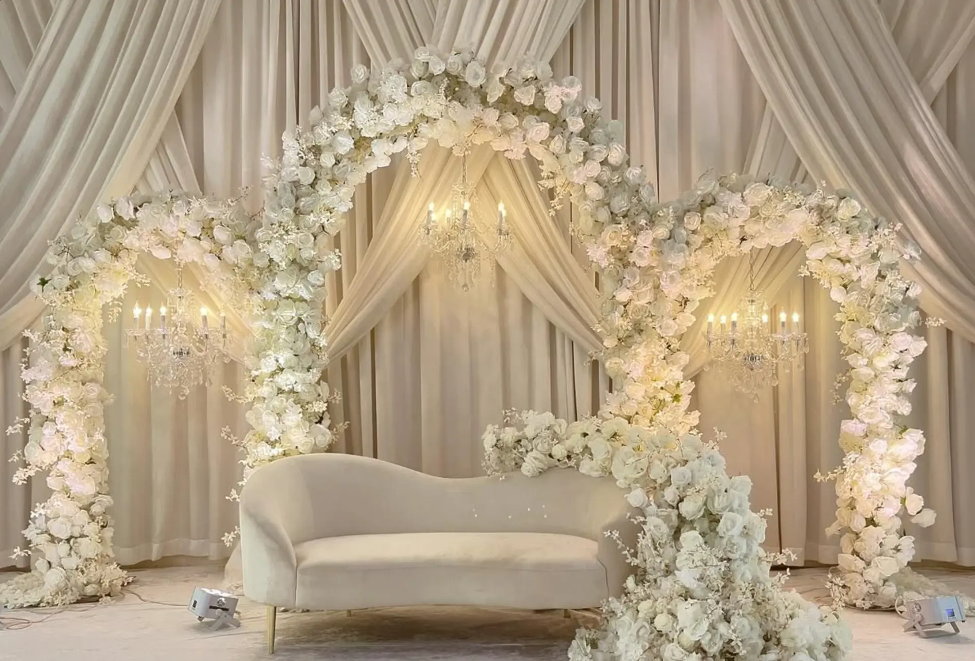 Signature package: Statement floral ceremony backdrop, 15 ft aisle runner, custom welcome sign and a 10 ft draped entrance walkway.